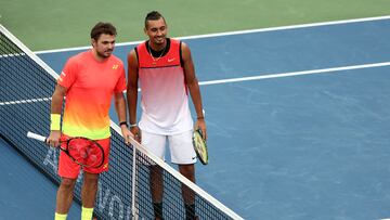 DUBAI, UNITED ARAB EMIRATES - FEBRUARY 26: Stan Wawrinka of Switzerland and Nick Kyrgios of Australia pose ahead of their semi final match on day seven of the ATP Dubai Duty Free Tennis Championship at the Dubai Duty Free Stadium on February 26, 2016 in Dubai, United Arab Emirates. (Photo by Warren Little/Getty Images)