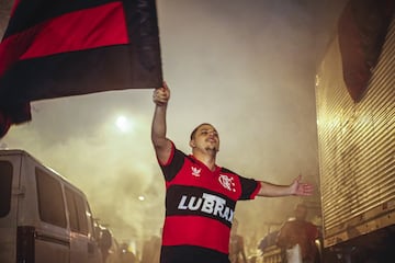 RIO DE JANEIRO, BRAZIL - NOVEMBER 23: A fan of Flamengo celebrates with a flag his team's win after the Flamengo v River Plate Copa CONMEBOL Libertadores 2019 Final in Rio de Janeiro, Brazil.