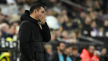 Barcelona's Spanish coach Xavi reacts during the Spanish league football match between Valencia CF and FC Barcelona at the Mestalla stadium in Valencia on December 16, 2023. (Photo by JOSE JORDAN / AFP)