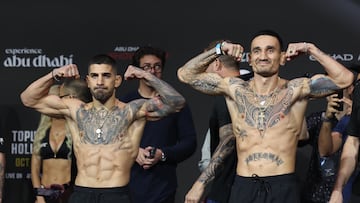 Abu Dhabi (United Arab Emirates), 25/10/2024.- Ilia Topuria (L) and Max Holloway (R) pose during the weigh-in for the featherweight championship bout at UFC 308, in Abu Dhabi, United Arab Emirates, 25 October 2024. The UFC 308 fight Topuria vs Holloway takes place on 26 October in Abu Dhabi. (Emiratos Árabes Unidos) EFE/EPA/ALI HAIDER