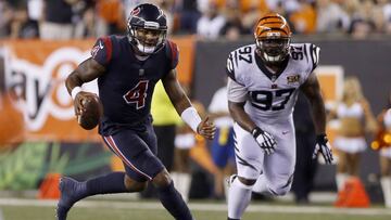 Sep 14, 2017; Cincinnati, OH, USA; Houston Texans quarterback Deshaun Watson (4) runs against Cincinnati Bengals defensive tackle Geno Atkins (97) during the second half at Paul Brown Stadium. Mandatory Credit: David Kohl-USA TODAY Sports