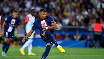 PARIS, FRANCE - AUGUST 13: Kylian Mbappe of Paris Saint-Germain kicks a penalty during the Ligue 1 match between Paris Saint-Germain and Montpellier HSC at Parc des Princes on August 13, 2022 in Paris, France. (Photo by Aurelien Meunier - PSG/PSG via Getty Images)