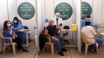 People receive a Pfizer/BioNTech COVID-19 vaccine dose during a coronavirus vaccination campaign at Lebanese American University Medical Center-Rizk Hospital in Beirut, Lebanon February 16, 2021. REUTERS/Mohamed Azakir