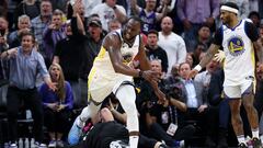 SACRAMENTO, CALIFORNIA - APRIL 17: Draymond Green #23 of the Golden State Warriors steps over Domantas Sabonis #10 of the Sacramento Kings in the second half during Game Two of the Western Conference First Round Playoffs at Golden 1 Center on April 17, 2023 in Sacramento, California. Green was issued a flagrant foul 2 on the play, and ejected from the game. NOTE TO USER: User expressly acknowledges and agrees that, by downloading and or using this photograph, User is consenting to the terms and conditions of the Getty Images License Agreement.   Ezra Shaw/Getty Images/AFP (Photo by EZRA SHAW / GETTY IMAGES NORTH AMERICA / Getty Images via AFP)