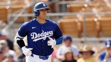 GLENDALE, ARIZONA - FEBRUARY 27: Shohei Ohtani #17 of the Los Angeles Dodgers walks back to the dugout after batting in the third inning during a game against the Chicago White Sox at Camelback Ranch on February 27, 2024 in Glendale, Arizona.   Christian Petersen/Getty Images/AFP (Photo by Christian Petersen / GETTY IMAGES NORTH AMERICA / Getty Images via AFP)