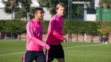 Rakitic y Rafinha.