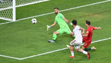 SARANSK, RUSSIA - JUNE 25: Mehdi Taremi of Iran shoots wide past Rui Patricio of Portugal during the 2018 FIFA World Cup Russia group B match between Iran and Portugal at Mordovia Arena on June 25, 2018 in Saransk, Russia. (Photo by Hector Vivas/Getty Images)