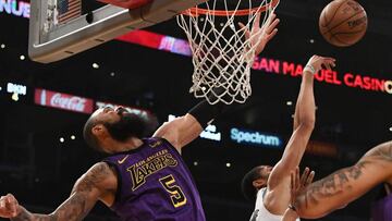 Mar 22, 2019; Los Angeles, CA, USA; Los Angeles Lakers center Tyson Chandler (5) reaches for the ball against Brooklyn Nets guard Spencer Dinwiddie (8) in the first half of a NBA game at the Staples Center. Mandatory Credit: Richard Mackson-USA TODAY Sports