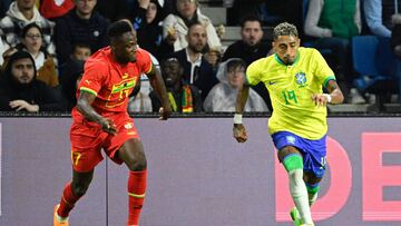 Brazil's defender Raphinha (R) fights for the ball with Ghana�s defender Bab Rahman during the friendly football match between Brazil and Ghana at the Oceane Stadium in Le Havre, northwestern France on September 23, 2022. (Photo by Damien MEYER / AFP)