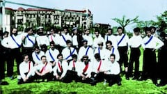 Real Madrid in the halcyon days of 1902. A white shirt with a purple stripe and black shorts.The stripe disappeared in 1905 while the black socks were standard until 1954.