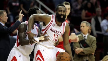 Jan 10, 2017; Houston, TX, USA; Houston Rockets guard James Harden (13) is embraced from behind by Houston Rockets guard Patrick Beverley (2) following Houston's 121-114 victory against the Charlotte Hornets at Toyota Center. Mandatory Credit: Erik Williams-USA TODAY Sports