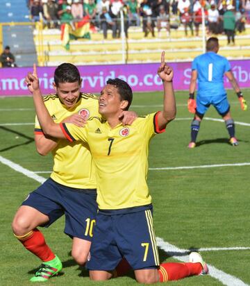 Colombia's Carlos Bacca celebrates with teammate James Rodriguez.