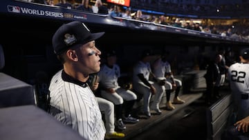 NEW YORK, NEW YORK - OCTOBER 30: Aaron Judge #99 of the New York Yankees looks out from the dugout prior to Game Five of the 2024 World Series against the Los Angeles Dodgers at Yankee Stadium on October 30, 2024 in the Bronx borough of New York City. Elsa/Getty Images/AFP (Photo by ELSA / GETTY IMAGES NORTH AMERICA / Getty Images via AFP)