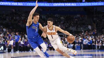 Jan 20, 2022; Dallas, Texas, USA; Phoenix Suns guard Devin Booker (1) drives to the basket past Dallas Mavericks center Dwight Powell (7) during the first half at American Airlines Center. Mandatory Credit: Kevin Jairaj-USA TODAY Sports
