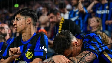 An inter Milan fan reacts during the UEFA Champions League final football match between Paris Saint-Germain (PSG) and Inter Milan in Munich, southern Germany on May 31, 2025. (Photo by Marco BERTORELLO / AFP)