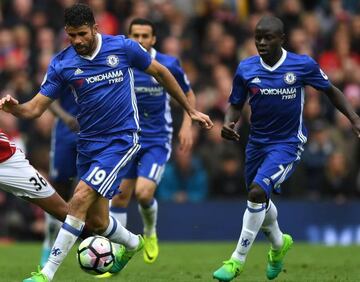 Diego Costa of Chelsea battles for possession during the Premier League match between Manchester United and Chelsea at Old Trafford