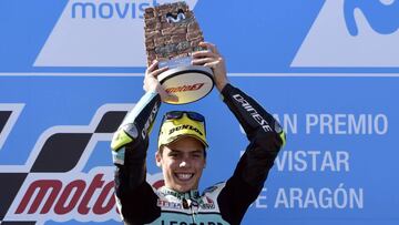 First placed Leopard Racing&#039;s rider from Spain, Joan Mir celebrates on the podium after the MOTO 3 race of the Moto Grand Prix of Aragon at the Motorland circuit in Alcaniz on September 24, 2017. / AFP PHOTO / JAVIER SORIANO