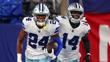 Dallas Cowboys safety Israel Mukuamu (24) returns a fumble recovery for a touchdown against the New York Giants