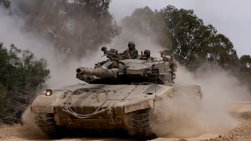A tank manoeuvres near the Israel-Gaza border, amid the ongoing conflict between Israel and the Palestinian Islamist group Hamas, in Israel, April 25, 2024. REUTERS/Amir Cohen