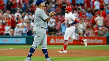 ST. LOUIS, MO - MAY 18: Julio Urias #7 of the Los Angeles Dodgers walks to the pitchers mound with a new ball after giving up a solo home run to Juan Yepez #13 of the St. Louis Cardinals during the third inning at Busch Stadium on May 18, 2023 in St. Louis, Missouri.   Scott Kane/Getty Images/AFP (Photo by Scott Kane / GETTY IMAGES NORTH AMERICA / Getty Images via AFP)