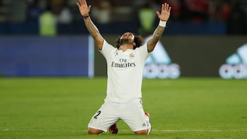 Soccer Football - Club World Cup - Final - Real Madrid v Al Ain - Zayed Sports City Stadium, Abu Dhabi, United Arab Emirates - December 22, 2018  Real Madrid's Marcelo celebrates after winning Club World Cup  REUTERS/Andrew Boyers