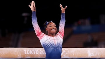 Simone Biles marks return with beam bronze