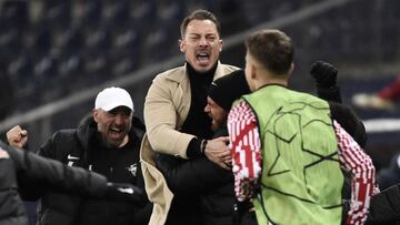 Salzburg&#039;s German head coach Matthias Jaissle (C) celebrates his team&#039;s win at the end of the UEFA Champions League Group G football match RB Salzburg v Sevilla in Salzburg, Austria on December 8, 2021. (Photo by HANS PUNZ / APA / AFP) / Austria