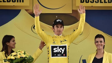 Great Britain&#039;s Geraint Thomas celebrates his overall leader yellow jersey on the podium at the end of a 14 km individual time-trial, the first stage of the 104th edition of the Tour de France cycling race on July 1, 2017 in and around Dusseldorf, Ge