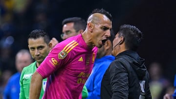       Nahuel Guzman of Tigres and Fernando Guerrero Referee 4 during the final second leg match between Club America and Tigres UANL as part of Torneo Apertura 2023 Liga BBVA MX, at Azteca Stadium, December 17, 2023, in Mexico City, Mexico.