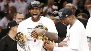 Miami Heat 95 (4) - San Antonio Spurs 88 (3). LeBron James con el título del equipo y el suyo como MVP con Dwyane Wade.