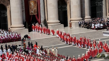 Clergy members walk to Saint Peter’s Basilica, on the day of Pope Francis' funeral Mass, at the Vatican, April 26, 2025. REUTERS/Remo Casilli