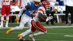 Kansas City Chiefs wide receiver Mecole Hardman Jr. (12) runs with the ball as Los Angeles Chargers cornerback Michael Davis (43) defends.