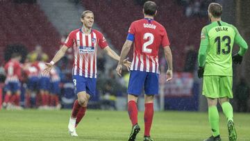Filipe, Godín y Oblak celebran el primer gol del Atlético ante el Valencia.
