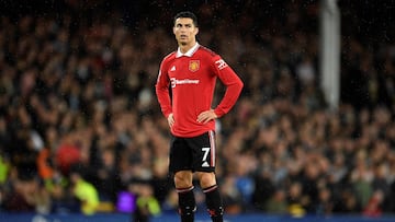 (FILES) In this file photo taken on October 09, 2022 Manchester United's Portuguese striker Cristiano Ronaldo looks on during the English Premier League football match between Everton and Manchester United at Goodison Park in Liverpool, north west England. - Cristiano Ronaldo's controversial second spell at Manchester United is to end with "immediate effect", the Premier League giants announced on November 22, 2022. The Portugal forward appeared to be on his way out of Old Trafford following a recent television interview in which he said he felt "betrayed" by the club and had no respect for new manager Erik ten Hag. (Photo by Oli SCARFF / AFP) / RESTRICTED TO EDITORIAL USE. No use with unauthorized audio, video, data, fixture lists, club/league logos or 'live' services. Online in-match use limited to 120 images. An additional 40 images may be used in extra time. No video emulation. Social media in-match use limited to 120 images. An additional 40 images may be used in extra time. No use in betting publications, games or single club/league/player publications. /