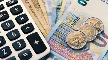 Close up of a calculator and euro money in a financial analyzing concept