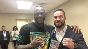 Deontay Wilder posing with Joseph Parker.