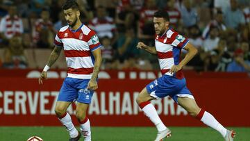 Vadillo (Granada CF) y Quini (Granada CF) durante un partido