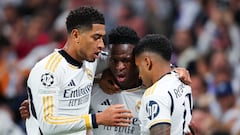 MADRID, SPAIN - APRIL 09: Rodrygo of Real Madrid celebrates with teammates Jude Bellingham and Vinicius Jr after scoring his side's second goal during the UEFA Champions League quarter-final first leg match between Real Madrid CF and Manchester City at Estadio Santiago Bernabeu on April 09, 2024 in Madrid, Spain. (Photo by James Gill - Danehouse/Getty Images)