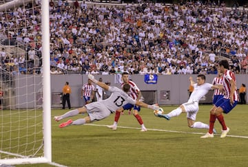 Jovic is injured after a collision with Jan Oblak.