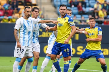 Víctor Chust y Ruben Alcaraz con los jugadores del Málaga, Izan Merino y Manu Molina.