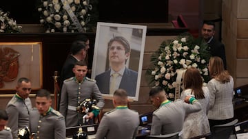 An image of Senator Miguel Uribe Turbay, who was shot in the head at a campaign event on June 7, ahead of the arrival of his coffin at Colombia's Congress, where a tribute will be held, in Bogota, Colombia, August 11, 2025. REUTERS/Luisa Gonzalez
