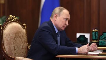 Russian President Vladimir Putin meets with Ingushetia's regional head at the Kremlin in Moscow on March 30, 2022. (Photo by Mikhail Klimentyev / SPUTNIK / AFP)