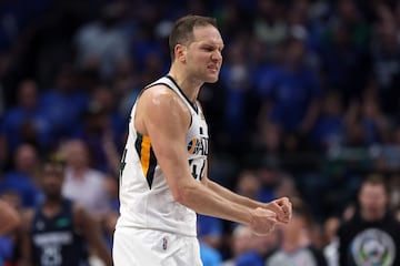 DALLAS, TEXAS - APRIL 16: Bojan Bogdanovic #44 of the Utah Jazz reacts after scoring a three-point shot against the Dallas Mavericks