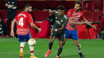 Marcus Rashford of Manchester United and Maxime Gonalons of Granada during the UEFA Europa League Quarter of Final round one match between Granada Futbol Club and Manchester United at Nuevos Los Carmenes Stadium on April 8, 2021 in Granada, Spain.
 AFP7 
