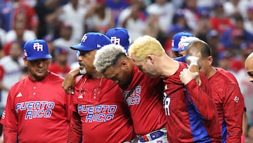 Edwin Diaz #39 of Team Puerto Rico is carried off the field after sustaining an injury while celebrating a 5-2 win against Team Dominican Republic during their World Baseball Classic Pool D game at loanDepot park on March 15, 2023 in Miami, Florida.