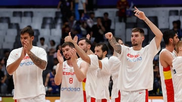 Spain players celebrate after the match.