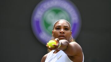 (FILES) In this file photo taken on July 8, 2019 US player Serena Williams serves against Spain's Carla Suarez Navarro during their women's singles fourth round match on the seventh day of the 2019 Wimbledon Championships at The All England Lawn Tennis Club in Wimbledon, southwest London. - Ranked a lowly 1,204 in the world and without a competitive singles match in 12 months, Serena Williams will sweep into Wimbledon targeting what would be her greatest triumph. The seven-time champion at the All England Club will also be chasing down a record-equalling 24th Grand Slam title. (Photo by GLYN KIRK / AFP) / RESTRICTED TO EDITORIAL USE