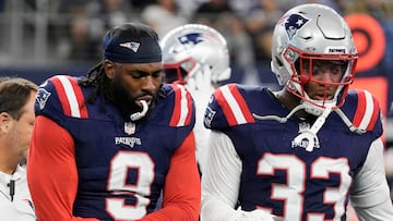 ARLINGTON, TEXAS - OCTOBER 01: Matthew Judon #9 of the New England Patriots holds his arm while walking off the field while consoled by Anfernee Jennings #33 of the New England Patriots during the third quarter against the Dallas Cowboys at AT&T Stadium on October 01, 2023 in Arlington, Texas. Sam Hodde/Getty Images/AFP (Photo by Sam Hodde / GETTY IMAGES NORTH AMERICA / Getty Images via AFP)