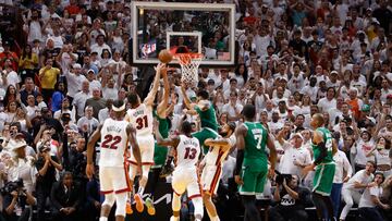 Boston Celtics guard Derrick White (3-R) tips in the winning basket as the buzzer sounds during the second half of the NBA basketball Eastern Conference Finals playoff game six between the Miami Heat and the Boston Celtics at the Kaseya Center in Miami, Florida, USA, 27 May 2023.