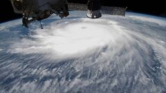 This NASA handout photo released August 30, 2020 shows Hurricane Laura  pictured on August 26, 2020 in the afternoon off the coast of the Texas-Louisiana border as the International Space Station orbited above the Gulf of Mexico. - US President Donald Tru